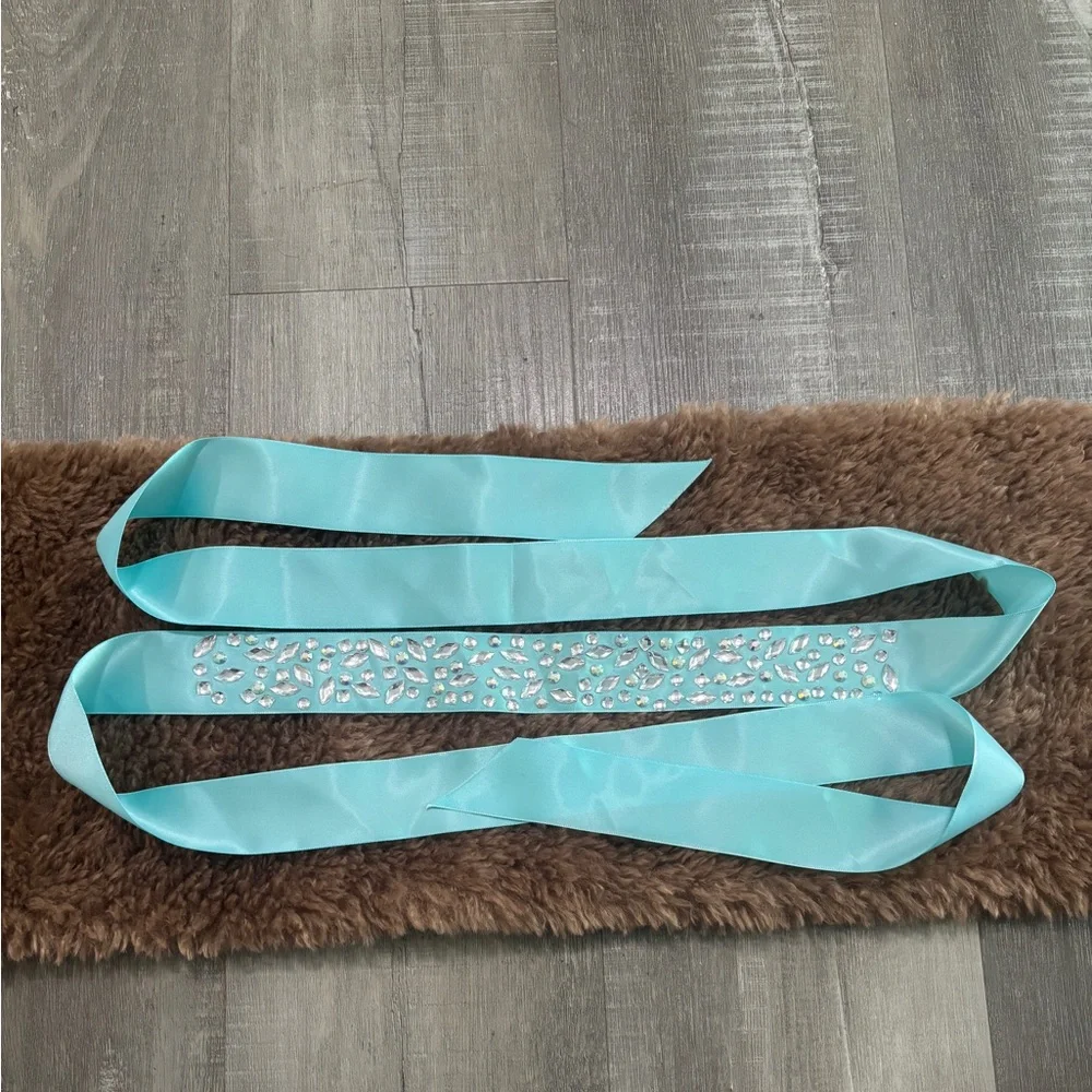 Elegant Turquoise Sash with Rhinestone Detailing